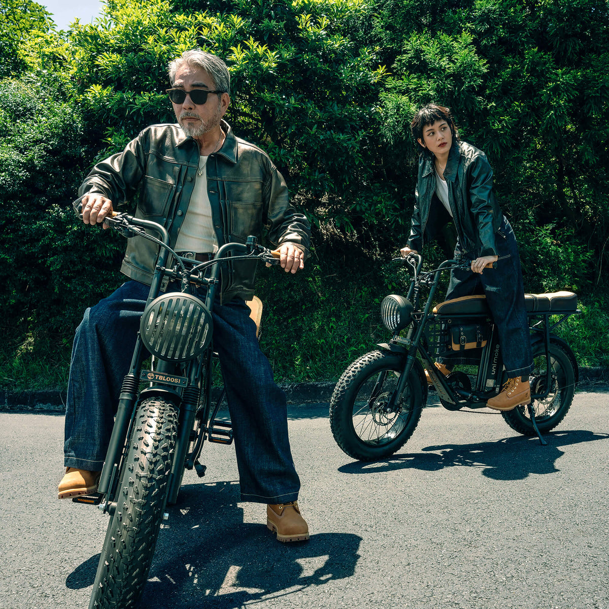 Two riders on Urban Drivestyle × Timberland collaboration e-bikes, seen from above