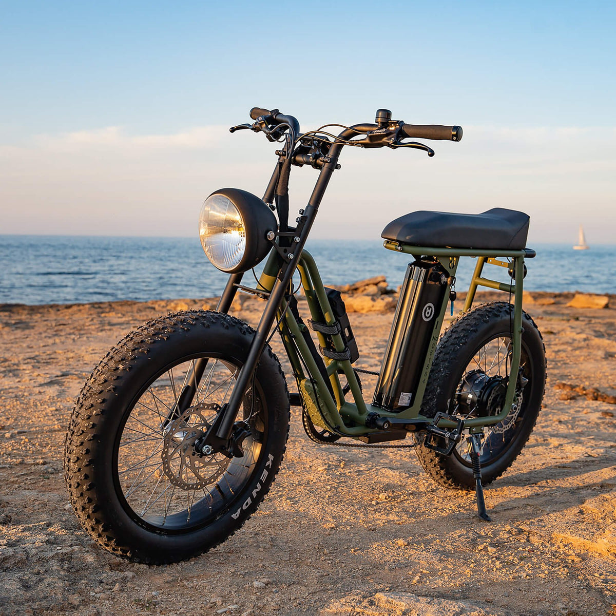 Unimoke SW parked on the sand at sunset